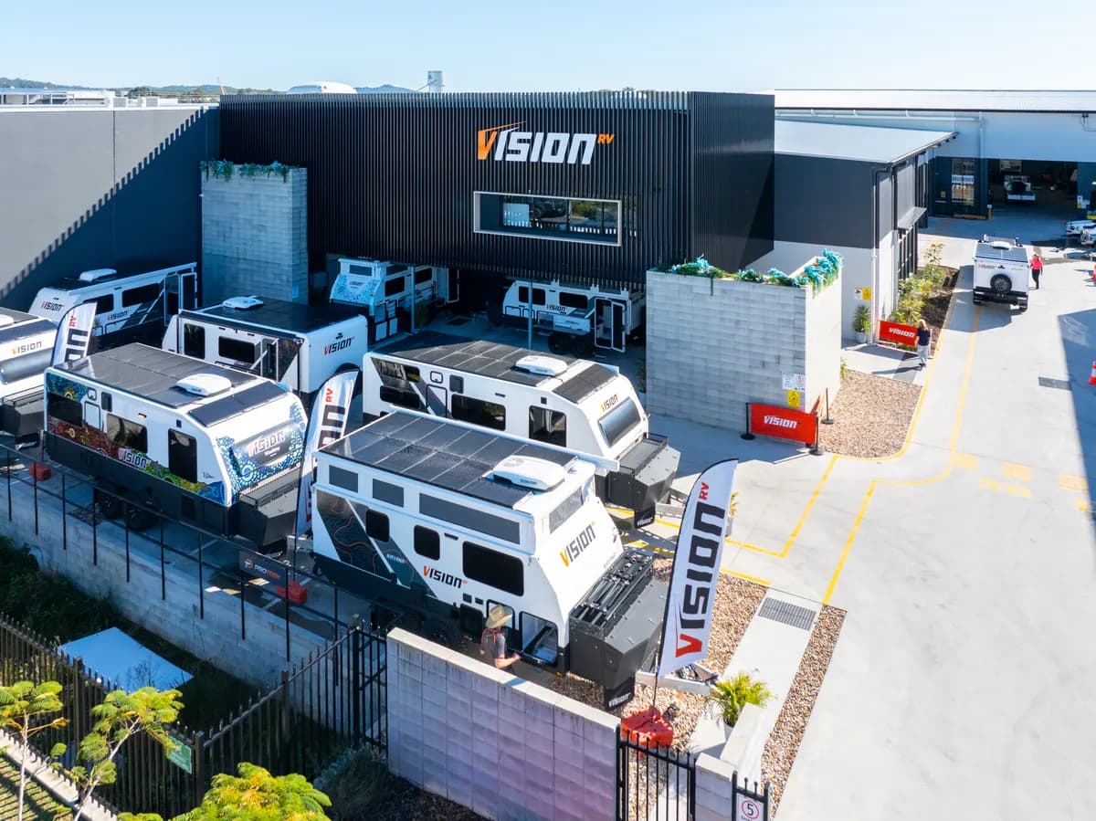 Vision RV factory and showroom frontage with caravans on display
